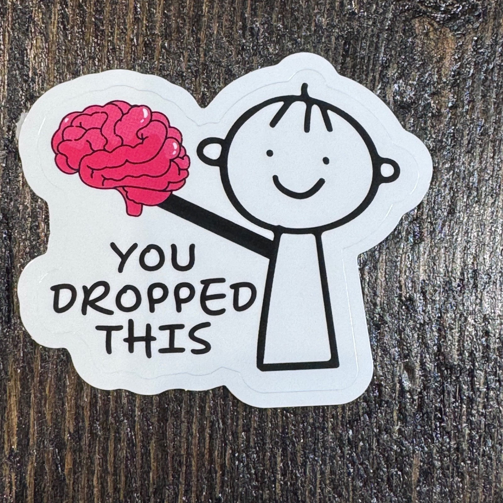 Stick figure with brain sticker -You dropped this – water bottle locker student
