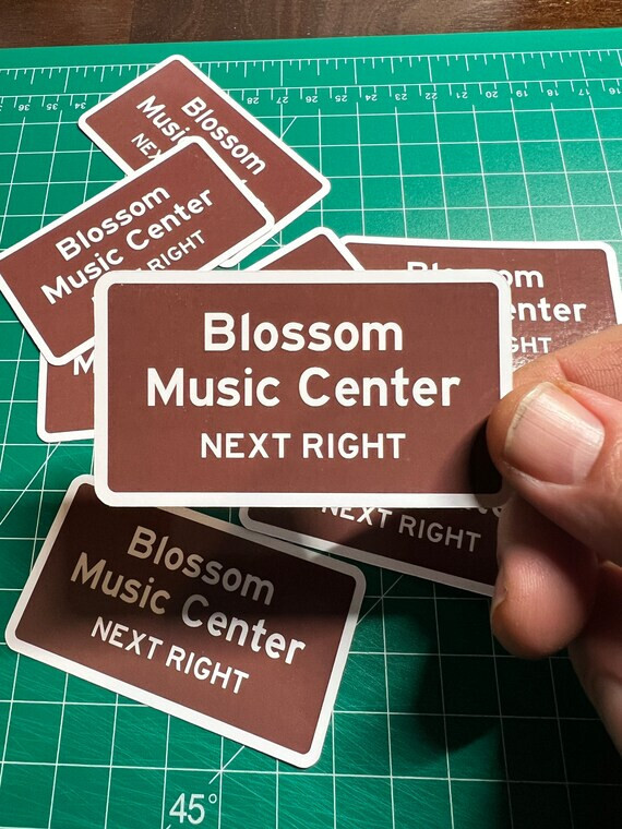 Blossom Music Center Road Sign – Laminated Vinyl Sticker – 2″x3″