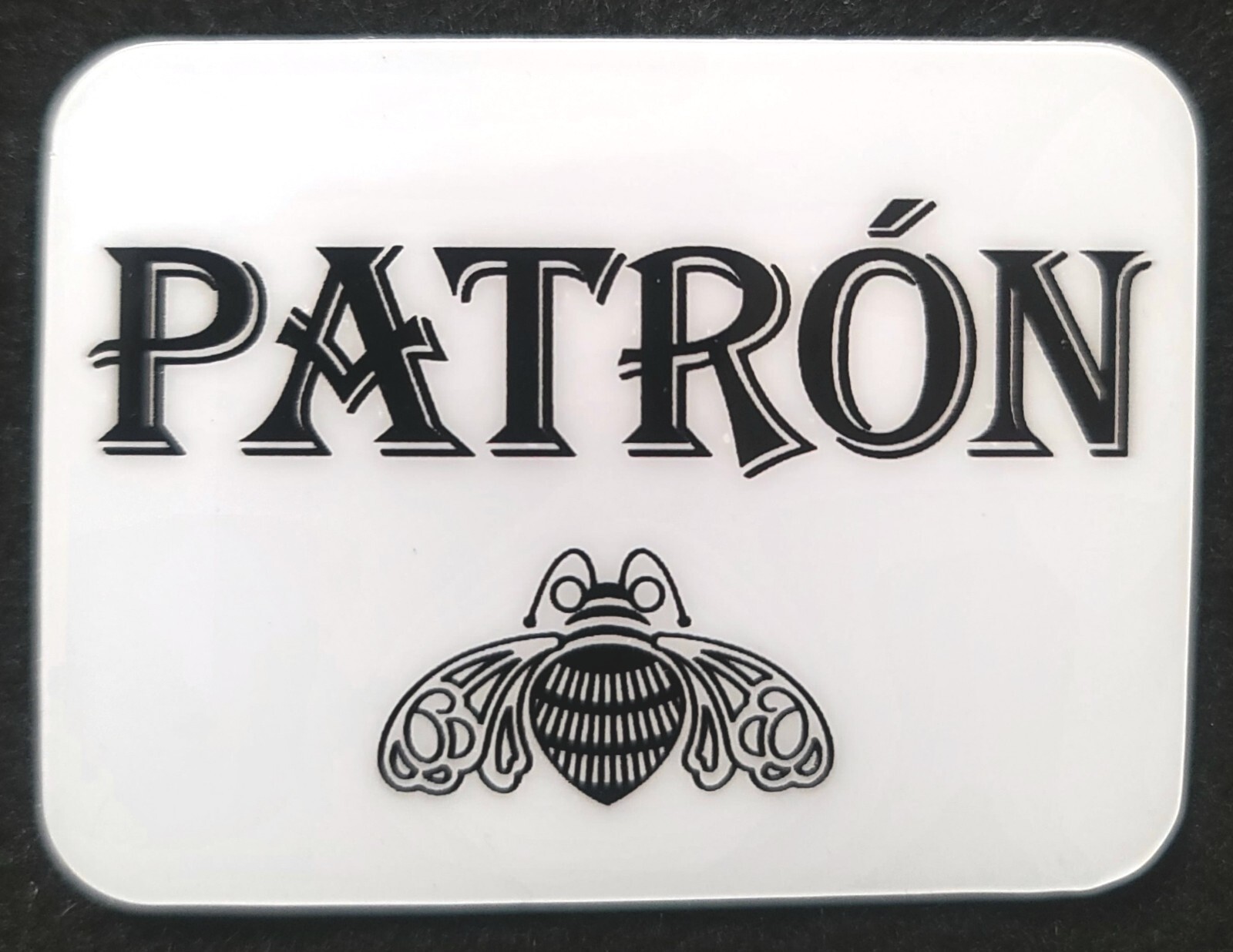 PATRON STICKER “BLACK ON WHITE” 2 3/4 X 2 1/8″ GLOSSY THICK WATERPROOF